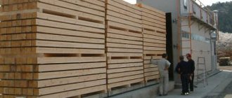 loading timber into the drying chamber